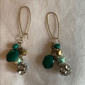 Green and gold dangle earrings
